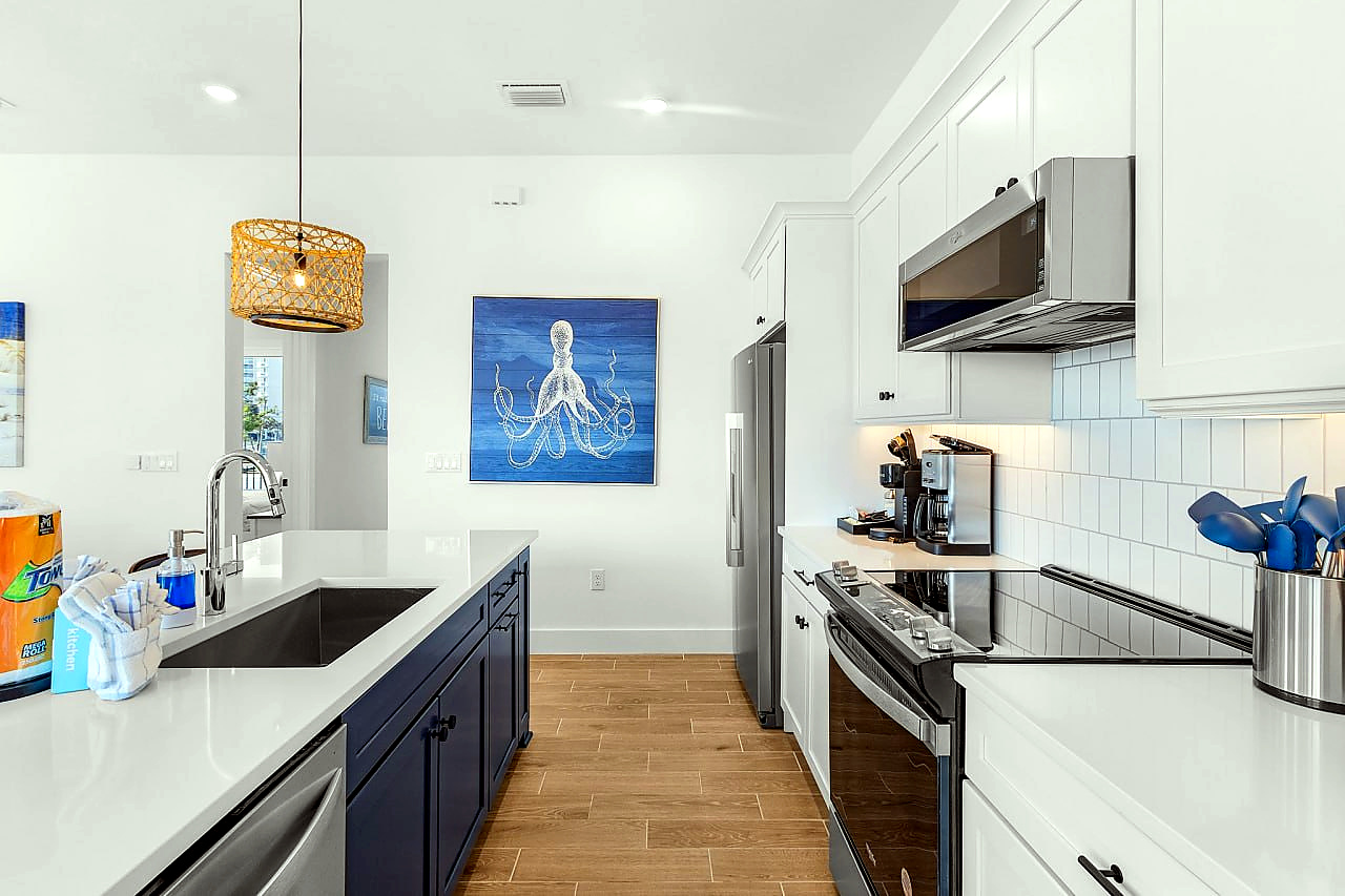 Do We Beach House interior living kitchen and gathering space photo